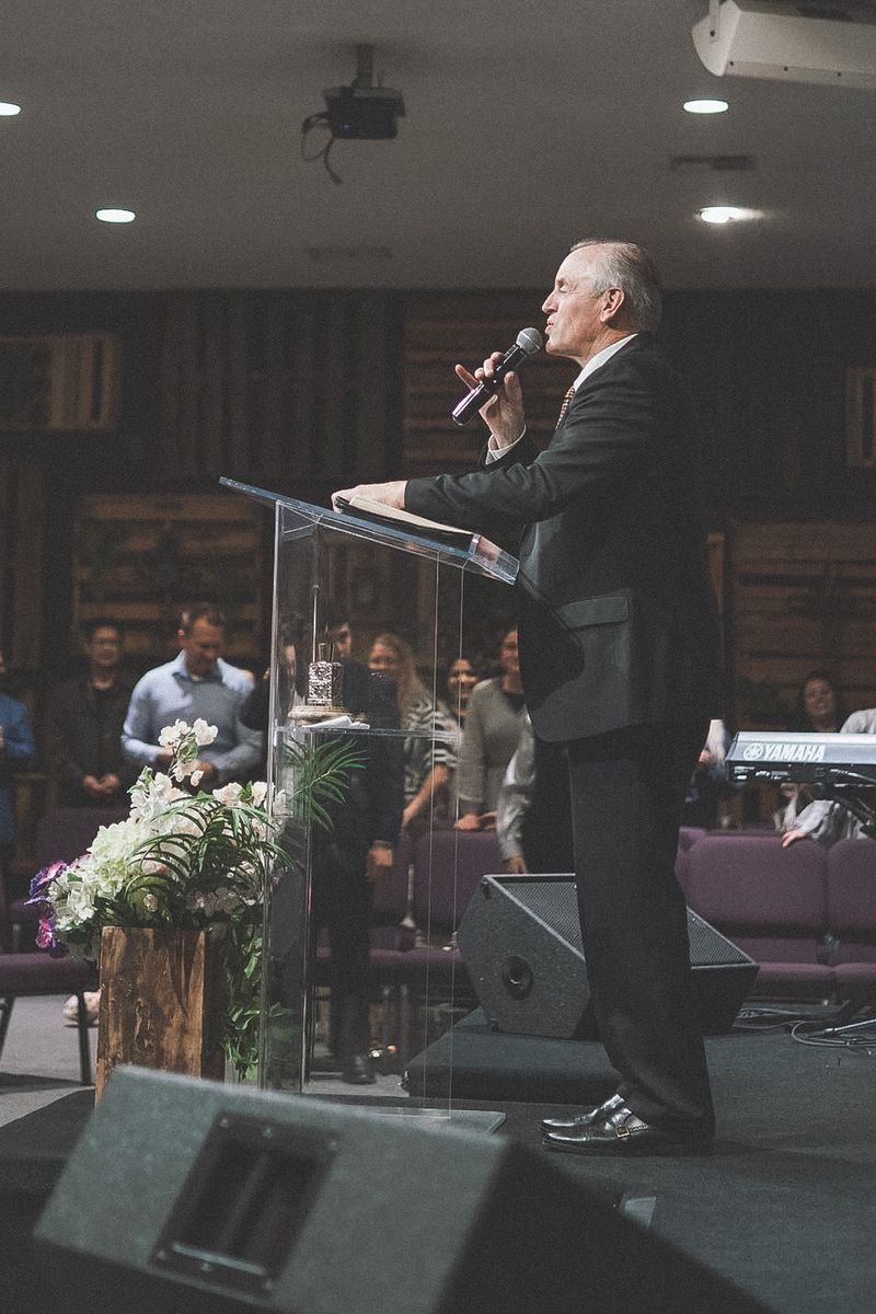 Pastor preaching midweek